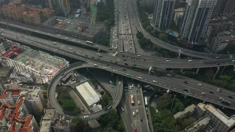 day time guangzhou city center traffic street road junction aerial topdown panorama 4k china