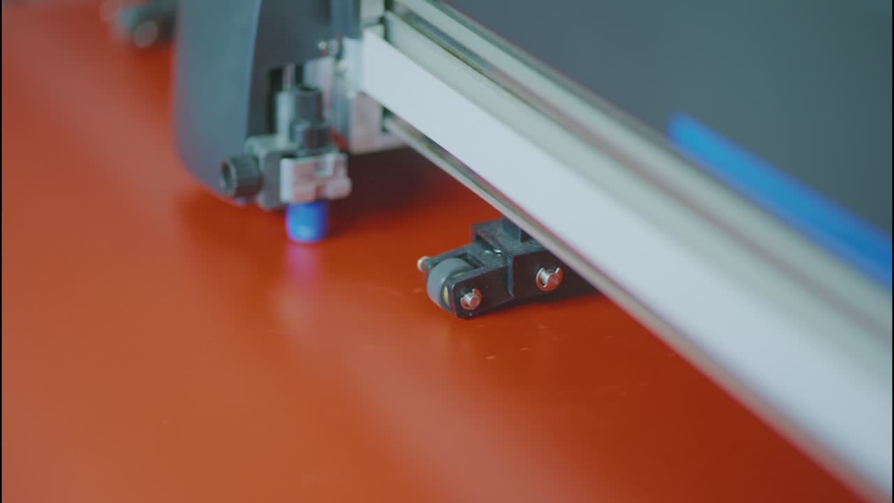 Vinyl cutting machine working on a piece of vinyl