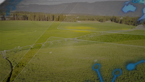 using digital map overlay, irrigation system watering green field in australia