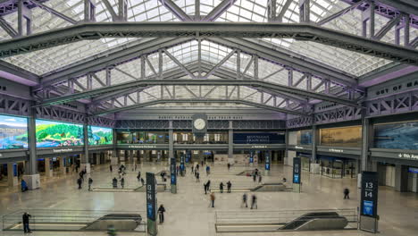 new york ny usa-january 8th, 2021 visitors to the daniel patrick moynihan train hall at pennsylvania station in new york enjoy the new space from the top level