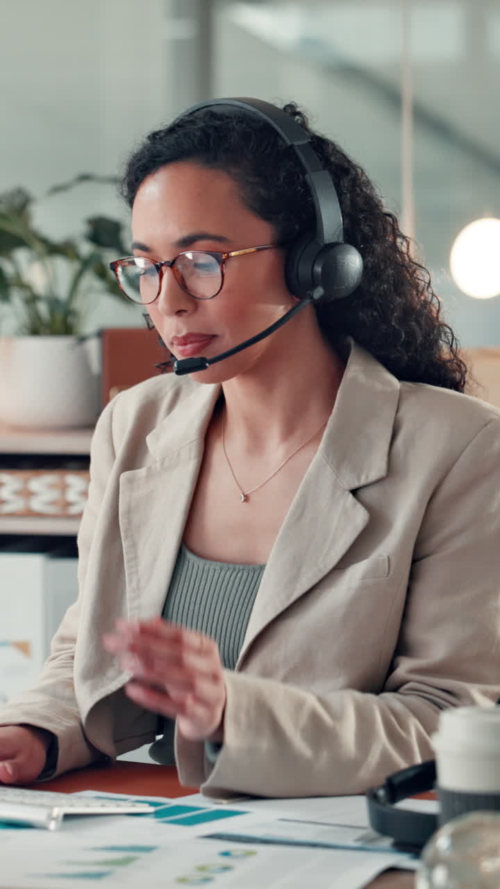 Young Woman Wearing Headset and Speaking in an Office