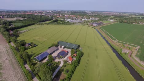 Aerial:-Farmland-and-farm-near-Middelburg,-the-Netherlands