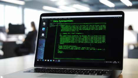 examining complex data synchronization code on a laptop displayed in a bright office environment, showcasing a programmer's work in progress