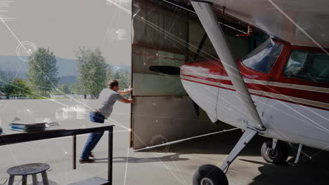 animation of network of connections over airplane in hangar