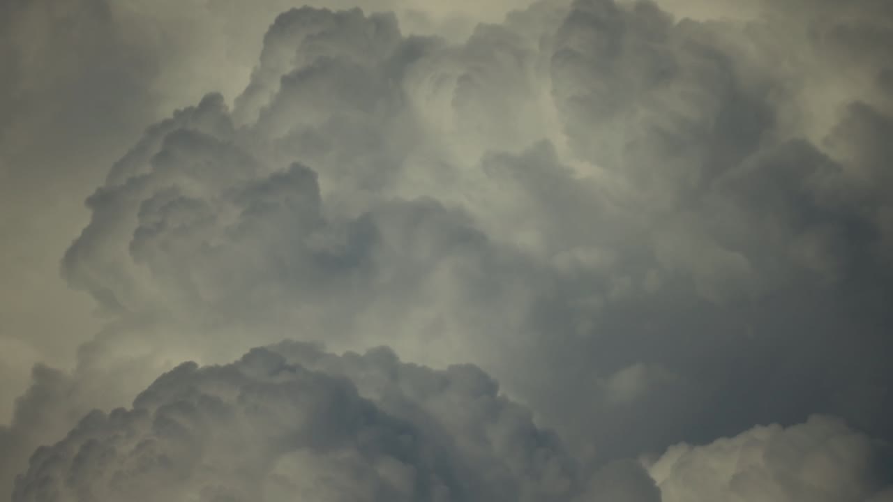 Timelapse video capturing the rapid movement of dark rain clouds across the sky