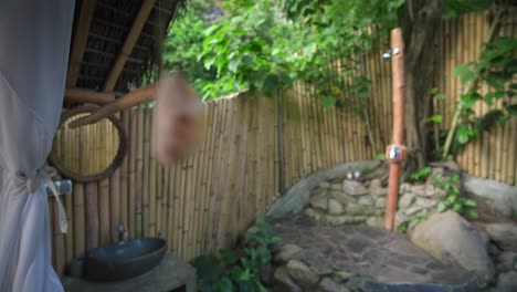 luxury glamping hut shower with garden view