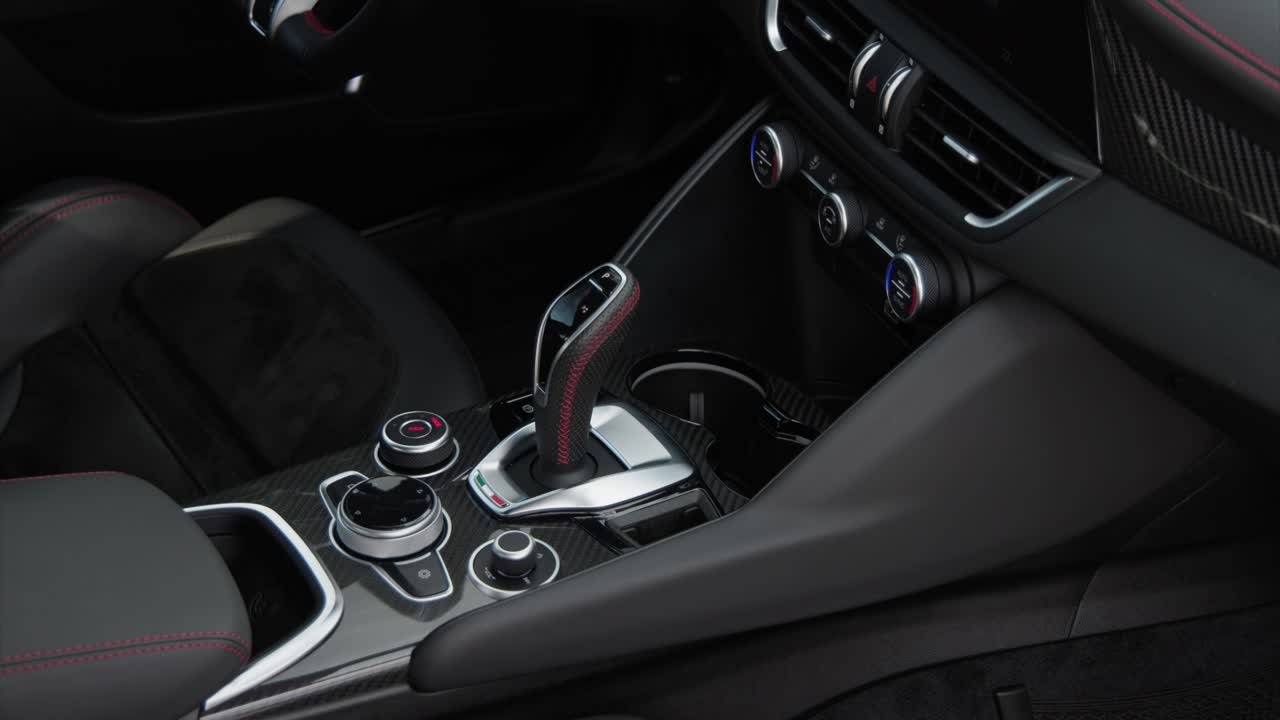 alfa romeo giulia quadrifoglio center console detail from right door