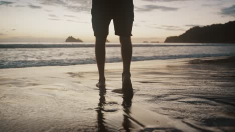 Man-Walking-Towards-The-Beach-Barefooted.-Slow-Motion