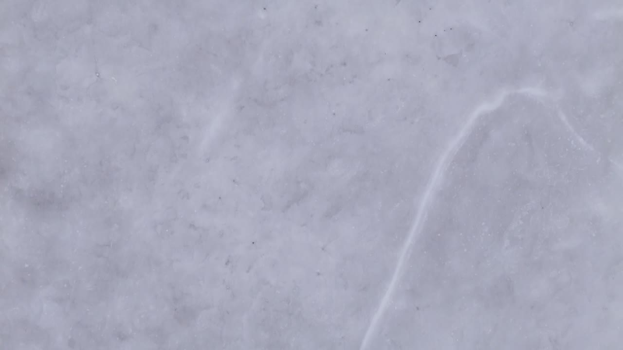 Top Down Aerial View Of Ice Texture On A Frozen Lake During Winter In Canada After A Deep Freeze