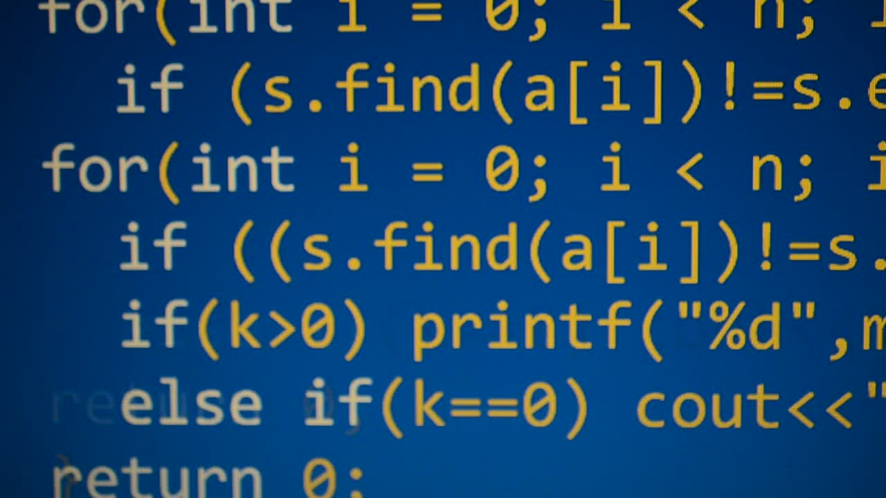 Source code on the monitor screen. Source code