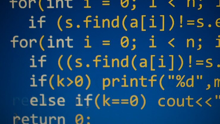 Source code on the monitor screen. Source code