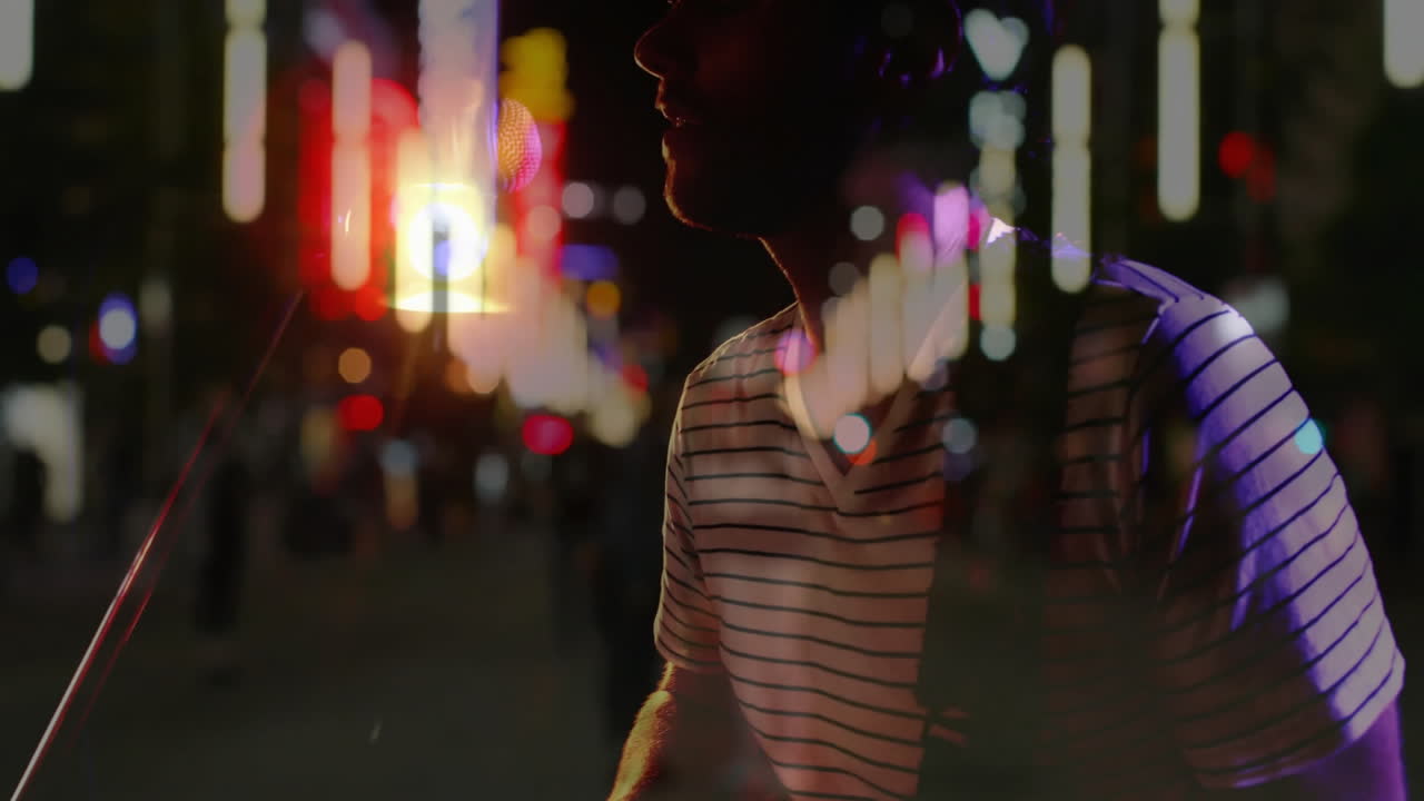 male singer performing music at night, with animated waveform overlays dancing around microphone