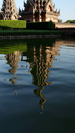 reflection of a thai temple in water