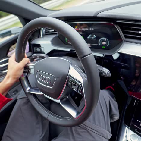man riding in a car