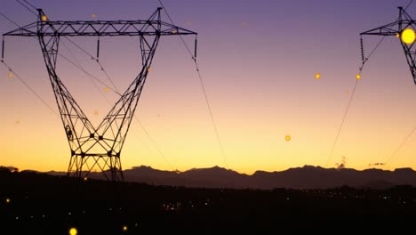 Animation-of-lens-flares-over-transmission-tower-against-silhouette-of-mountains