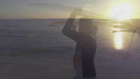 male surfer holding surfboard above head on sunset beach, with travel app wave graph overlay