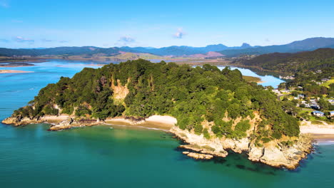 rugged tropical beach in north island, new zealand