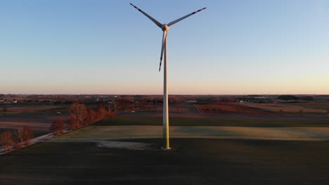 Electrical-windmill-in-the-middle-on-field