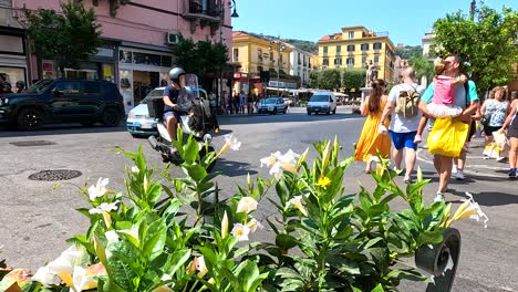 people crossing street in sorrento, italy