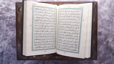 close up of holy book quran on table