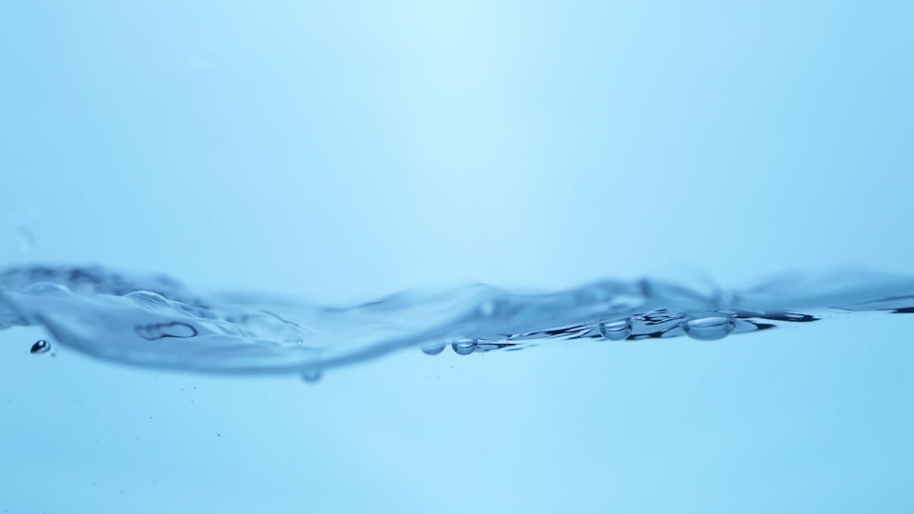 Crystal Clear Water Droplet Falling