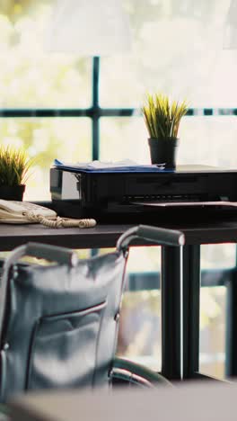 vertical video wheelchair in office offering accessibility to workers with disability