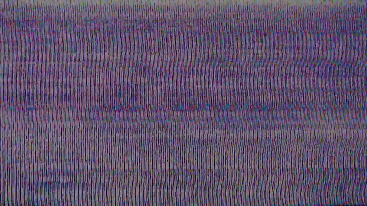 Authentic VHS tape noise with color bleeding, scan lines, and static glitch effects. Seamless loop for creating a retro 80s or 90s television look. Use as an overlay or background
