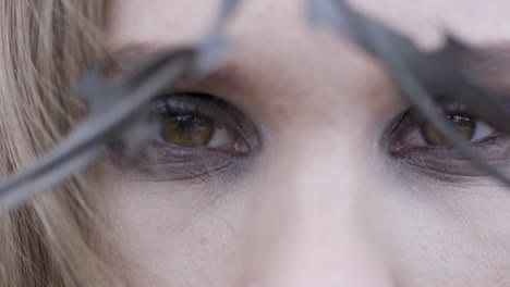 woman behind razor wire