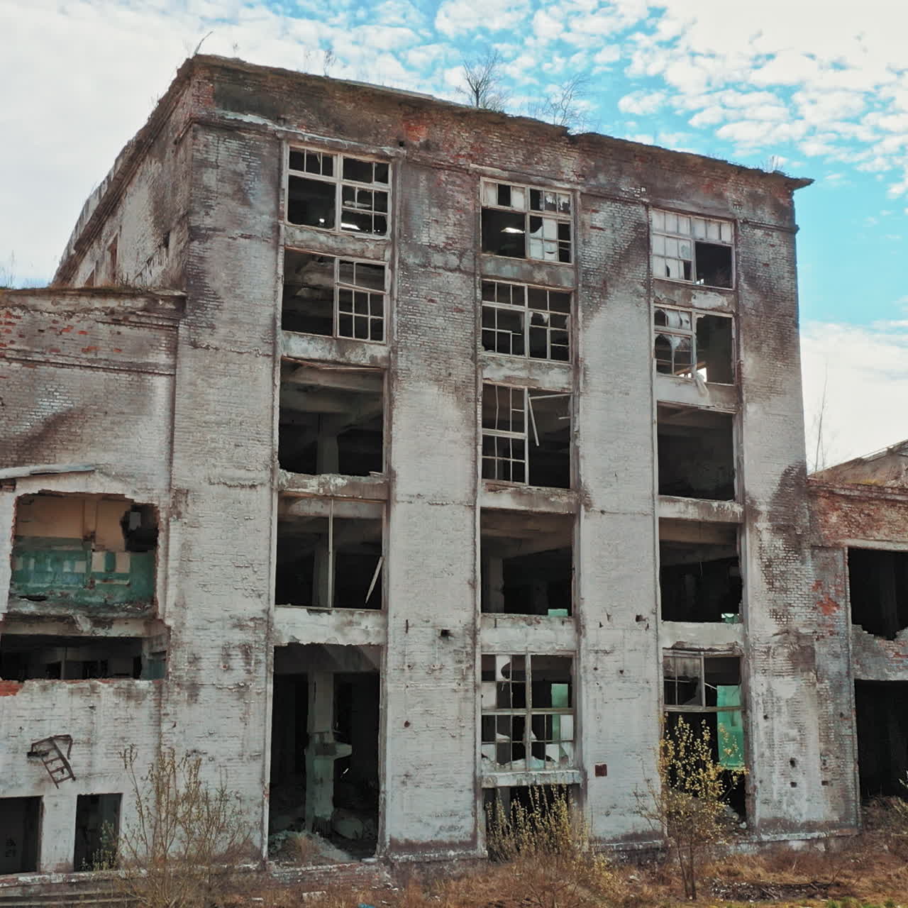 Aerial view of an abandoned industrial plant. Factory ruins.