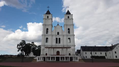 exterior of basilica of the assumption of aglona with white clouds in background in latvia, europe