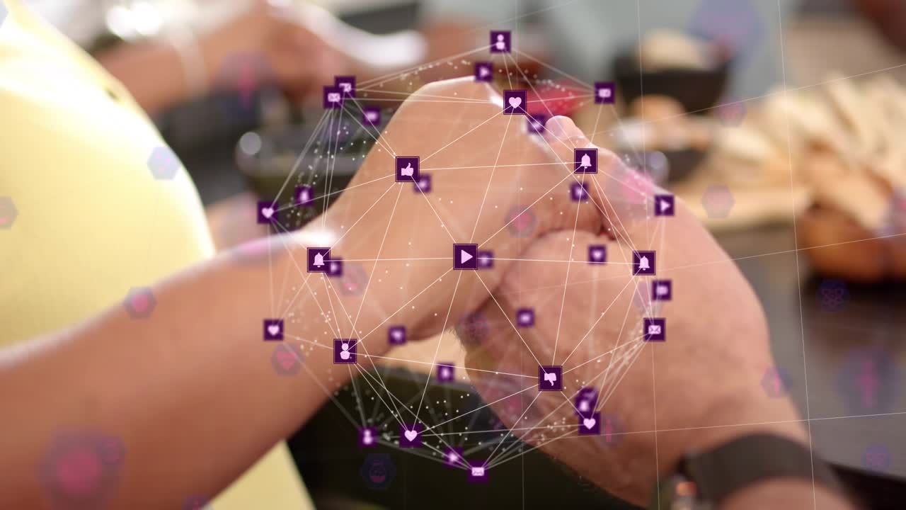 Senior woman, adult man reaching, starting purple tech network orbiting joined hands signaling bond
