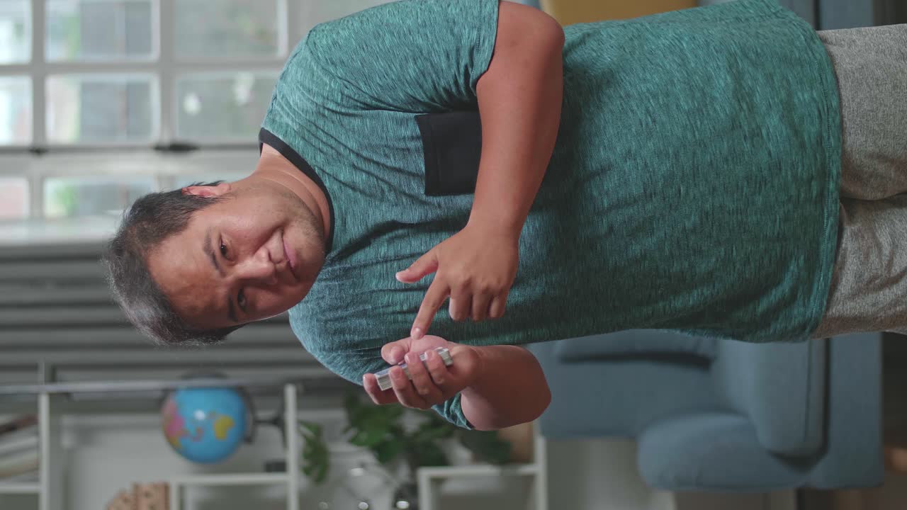 Asian Man Blogger Shoots Video Content For Social Networks, Magician With Playing Cards