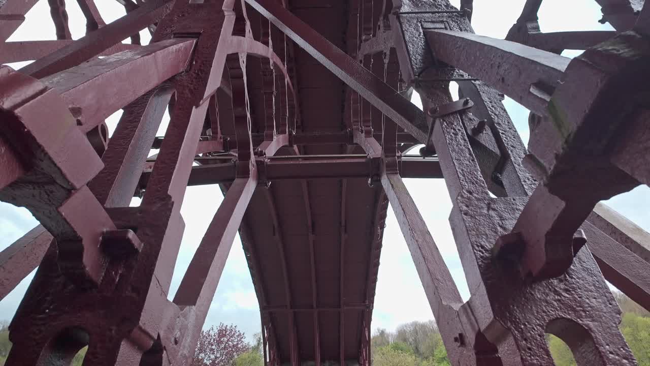 Looking up underneath metal framework of the River Severn Ironbridge