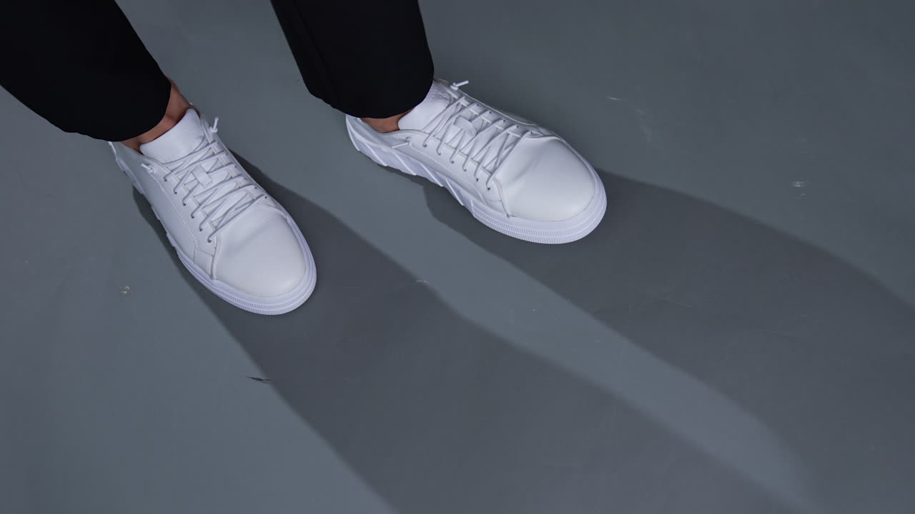 White Sneakers on Black Pants