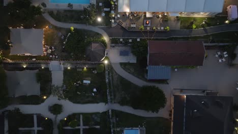 aerial rising shot of a wedding party at night in marquees in france