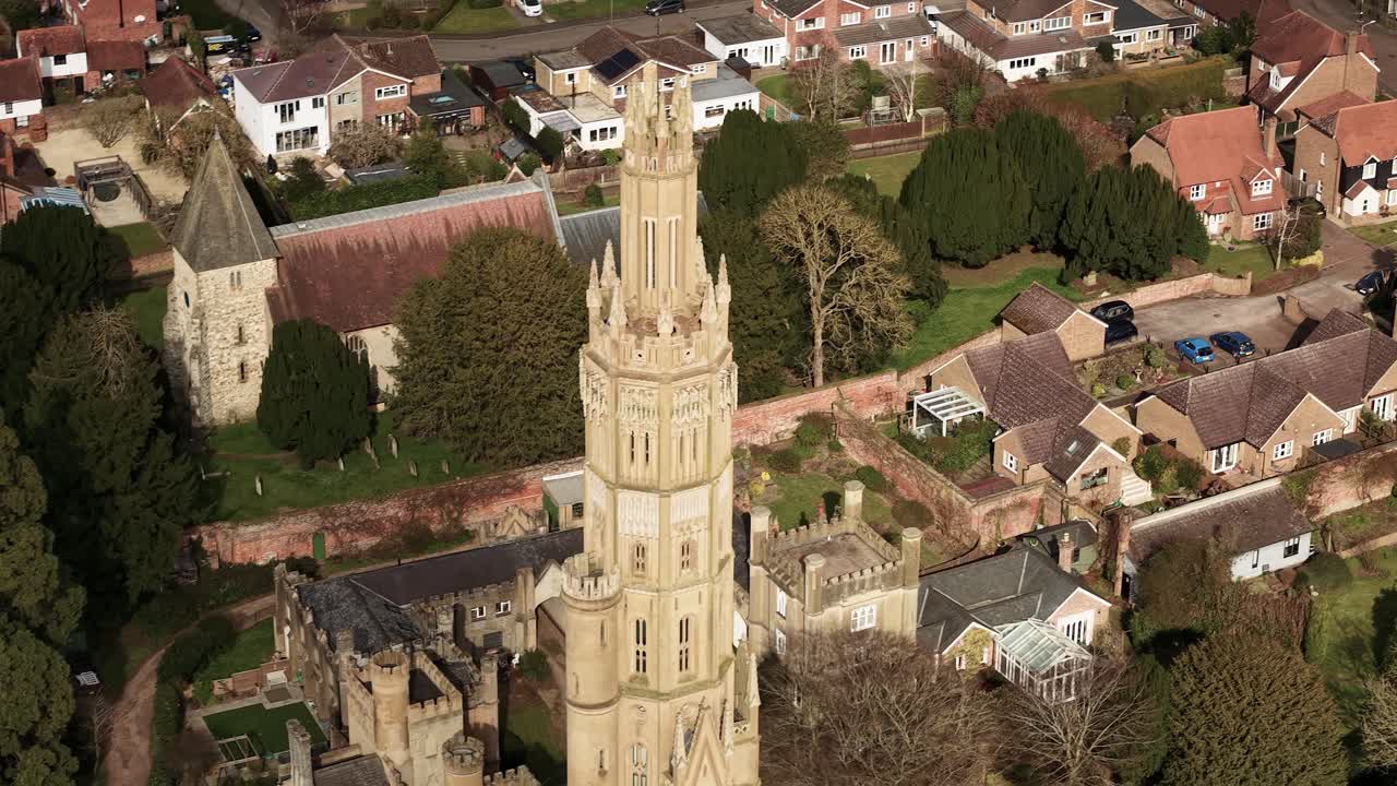 Aerial detail of Hadlow Tower with historic homes and medieval streets in Ken, England