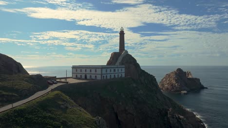 Silhouette-View-Of-Historic-Lighthouse-And-Cape-Vilan-Atop-Of-Rugged-Cliff-Offering-Astounding-Ocean-View-In-Camariñas,-Galicia,-Spain