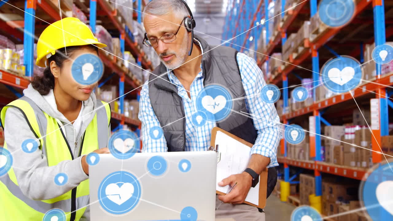 animación de la red de conexiones con iconos sobre hombre y mujer con computadora portátil en wearhouse