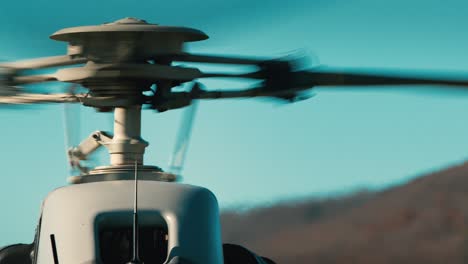 Close-up-on-a-helicopters-rotors-as-they-spin-in-slow-motion