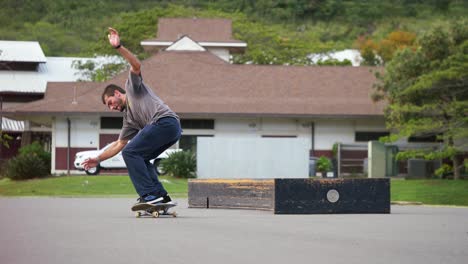 smith grind front side flip out on a curved ledge in hawaii