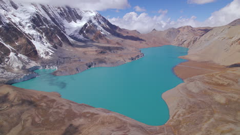 landscape of world's highest-altitude lake at nepal annapurna mountain circuit, drone shot reveals beauty of mountainous region, open weather, sunny, pleasant vacation 4k