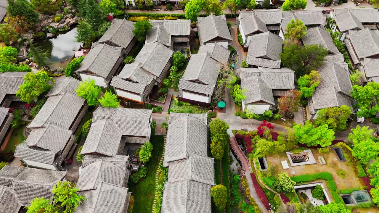 Aerial top down view of Dayan, the Old Town of Lijiang, in Yunnan, China, traditional Chinese architecture UNESCO world heritage