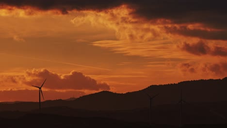 Timelapse-of-cloudy-sky-over-wind-generator