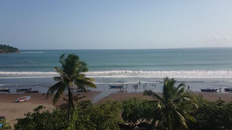 aerial top view of ocean waves break on a beach