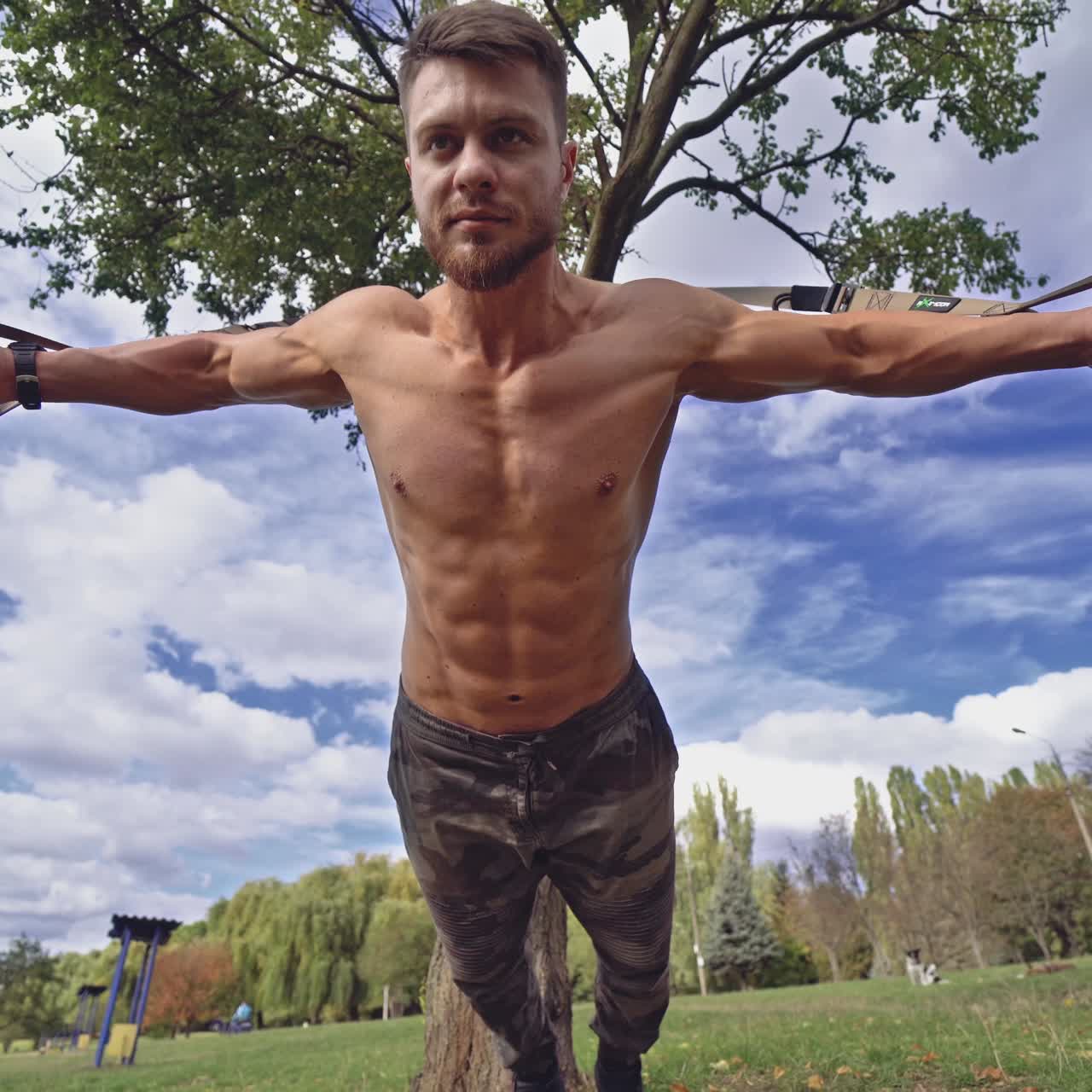 . Man doing fitness exercises. Fitness man during training workout