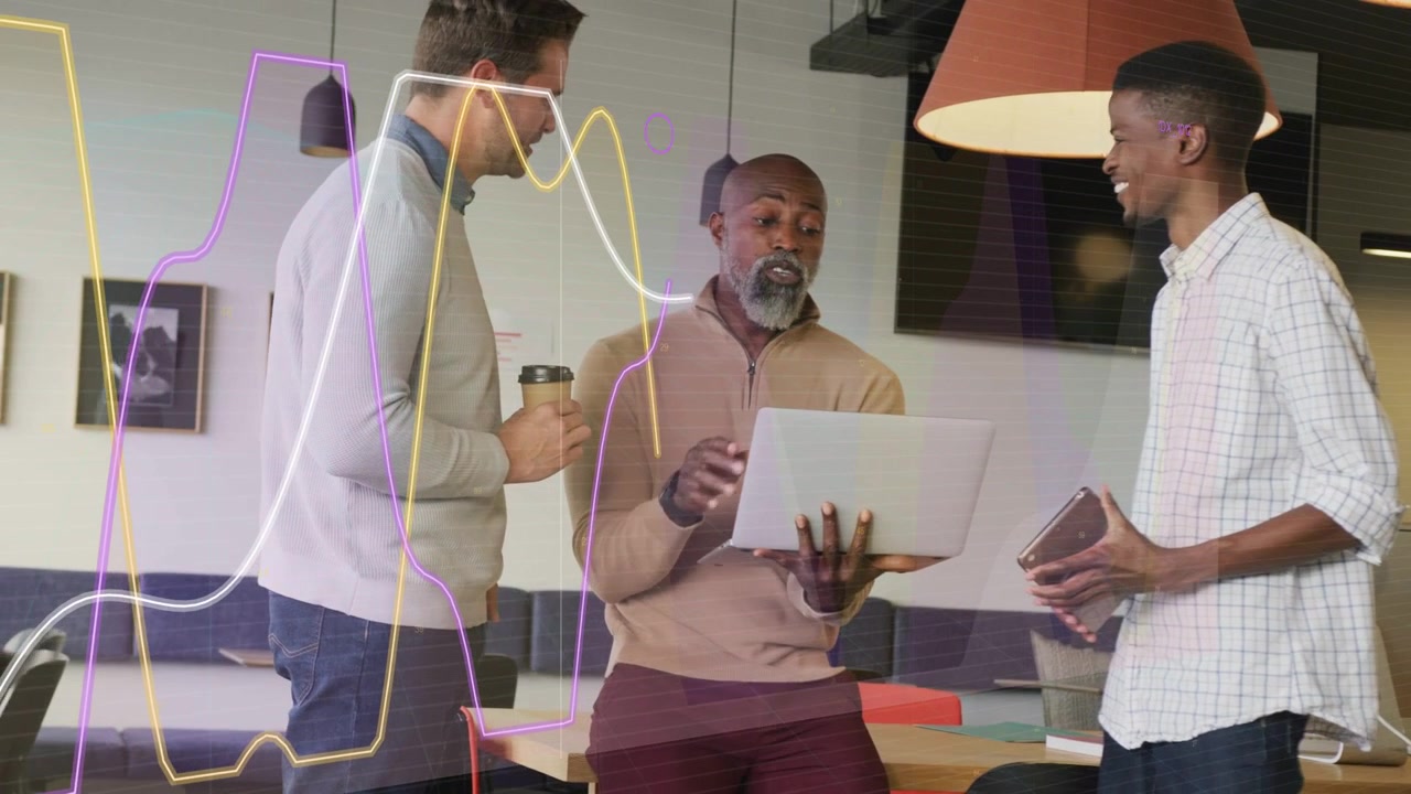 Lead tilting laptop, team leaning in and reviewing tech pitch while colored lines overlaying