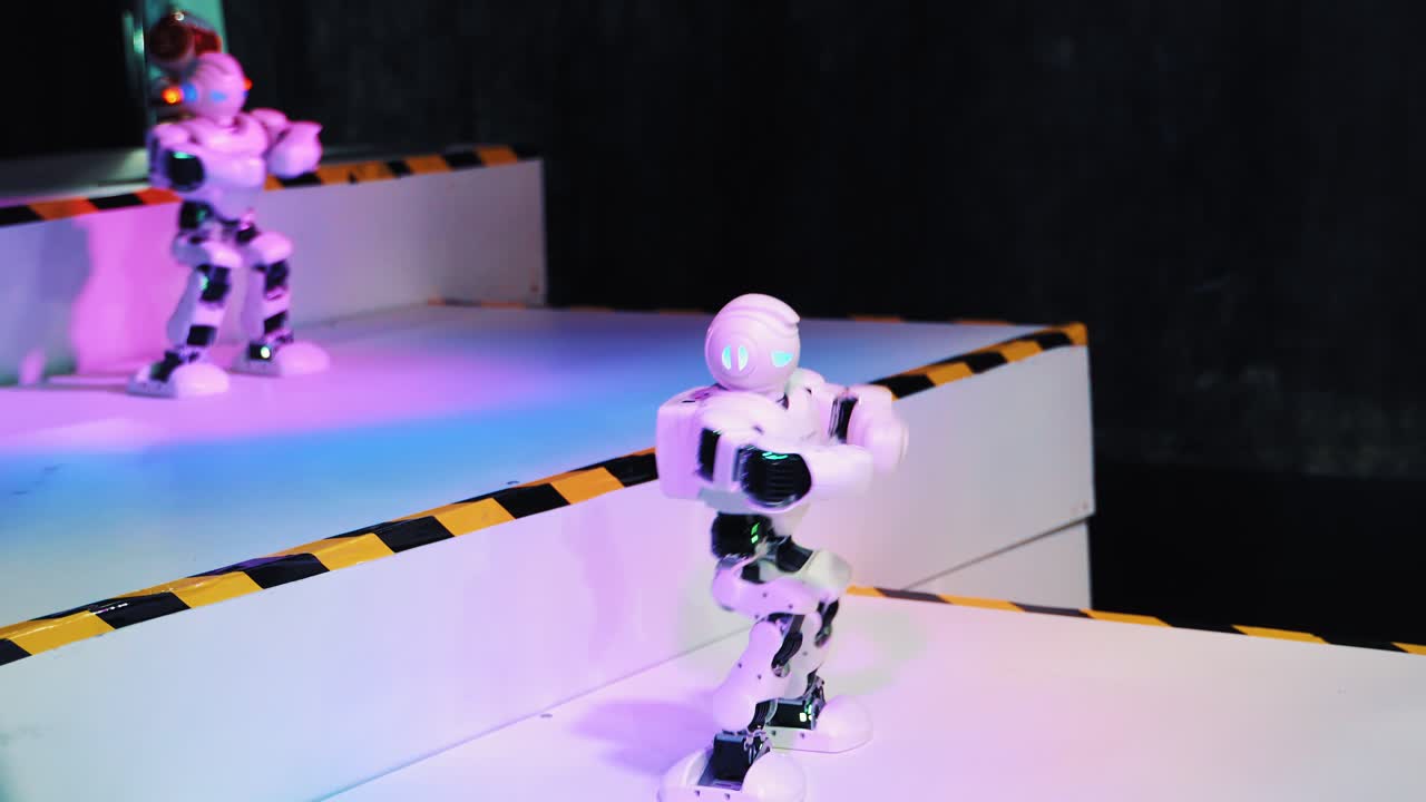 Robots dancing in an exhibition. Smart Robot. Robotic technology