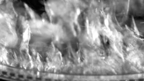 macro shot of fine air bubbles rising in water in glass test tube on black background effervescent macro shot of fine air bubbles rising in water in glass test tube on black background effervescent tablet aspirin the medicine concept health care treatment slow motion high quality full