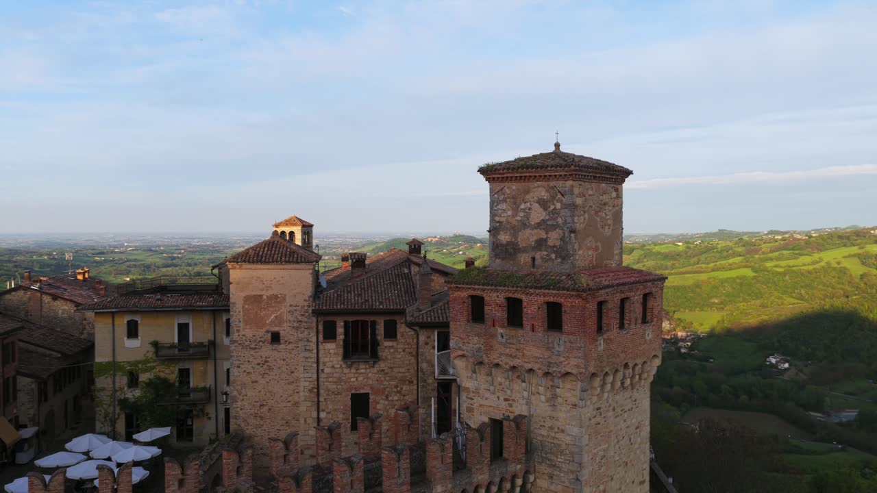 Borgo di Vigoleno - Historic Stone Castle With Towers In Vigoleno, Piacenza, Italy. pullback drone shot