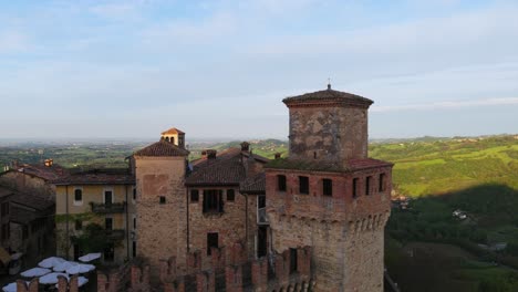 Borgo di Vigoleno - Historic Stone Castle With Towers In Vigoleno, Piacenza, Italy. pullback drone shot